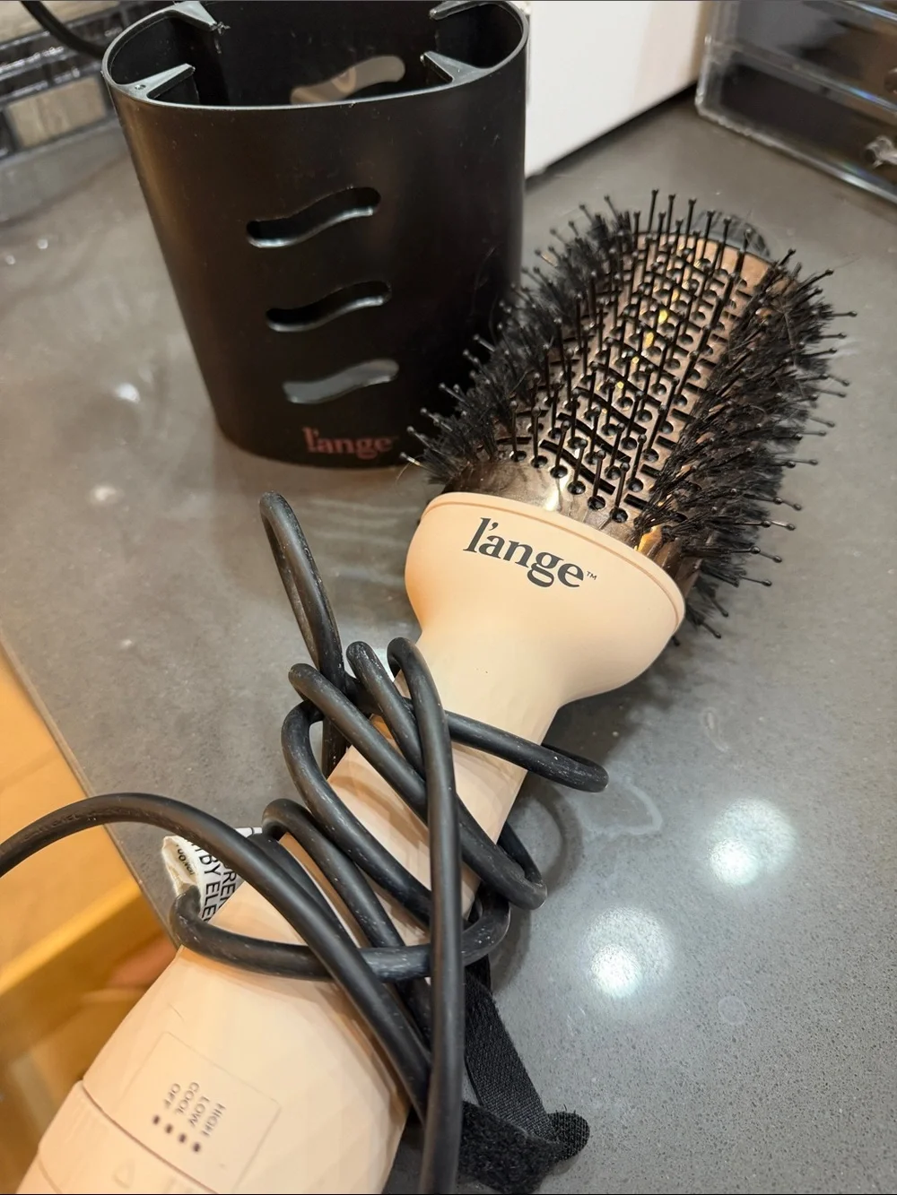 Lange beige and black round vented hair brush dryer attachment
